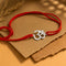 Zarkan OM With American Diamond Stone Silver Rakhi With Roli Chawal