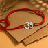 Zarkan OM With American Diamond Stone Silver Rakhi With Roli Chawal