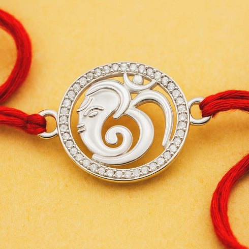 Zarkan OM Ganesha Pure Silver Rakhi With Roli Chawal