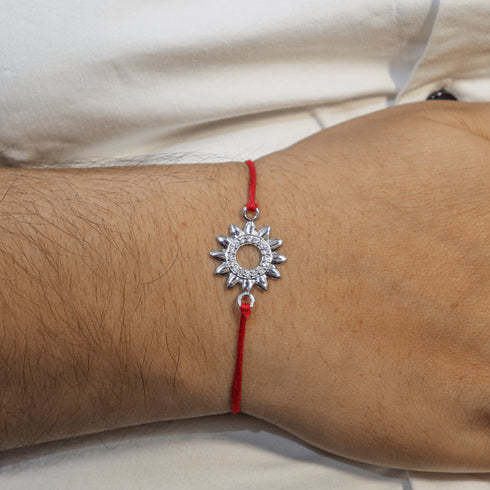 Zarkan Surya Precious Silver Rakhi With Roli Chawal