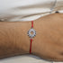 Zarkan Surya Precious Silver Rakhi With Roli Chawal