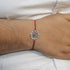 Zarkan Precious Silver OM Rakhi For Brother With Roli Chawal