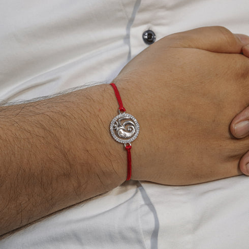 Zarkan OM Ganesha Pure Silver Rakhi With Roli Chawal