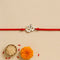 Zarkan OM With Ruby Stone Silver Rakhi With Roli Chawal