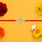 Zarkan OM Pure Silver Rakhi With Roli Chawal
