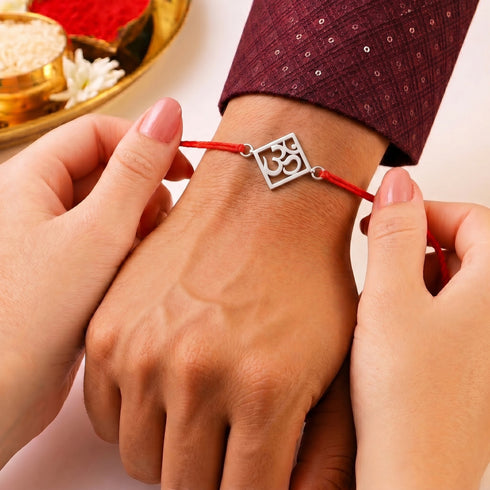 Zarkan OM Pure Silver Rakhi With Roli Chawal