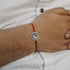 Zarkan OM Ganesha Pure Silver Rakhi With Roli Chawal