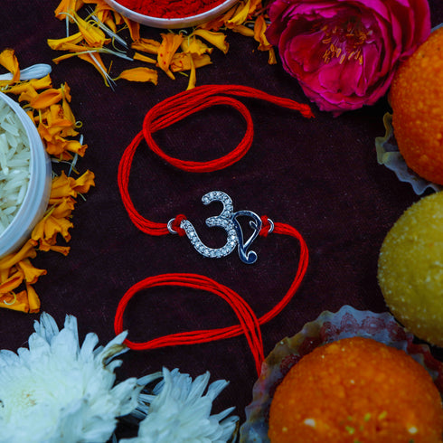 Zarkan OM AD Pure Silver Rakhi With Roli Chawal